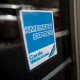 The American Express logo in a shop window in New York.