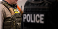 US Immigration and Customs Enforcement (ICE) agents in Chicago, Ill. on Sunday, Jan. 26, 2025.