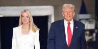 Pam Bondi, left, and Donald Trump walk down a hall together