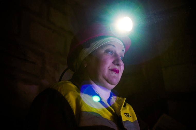 While the battle rages overhead, the women coal miners of eastern Ukraine are picking up the slack.