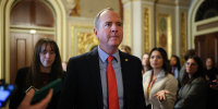 Adam Schiff with reporters at the Capitol