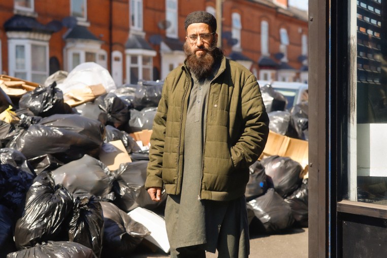 Ghulam Murtaza Qureshi stands in front of his fast-food restaurant, Kabir's, in Birmingham, U.K., on April 9, 2025.