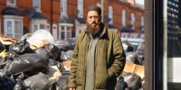Ghulam Murtaza Qureshi stands in front of his fast-food restaurant, Kabir's, in Birmingham, U.K., on April 9, 2025.