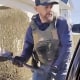 An ICE agent smashes Marilu Mendez's car window in New Bedford, Mass.