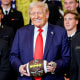 President Donald Trump during a presentation ceremony for the Commander-in-Chief Trophy to the Navy Midshipmen football team in the East Room of the White House April 15, 2025. 