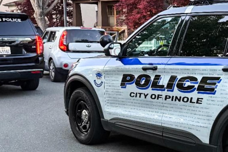A Pinole Police Department vehicle. on a street