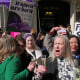 Members of "For Women Scotland" celebrate outside the U.K. Supreme Court in London after it ruled that a woman is someone born biologically female on April 16, 2025. 