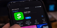 The Cash App is seen on the Apple store on a mobile phone