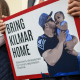 A member of the Congressional Hispanic Caucus holds a picture of Kilmar Abrego Garcia.
